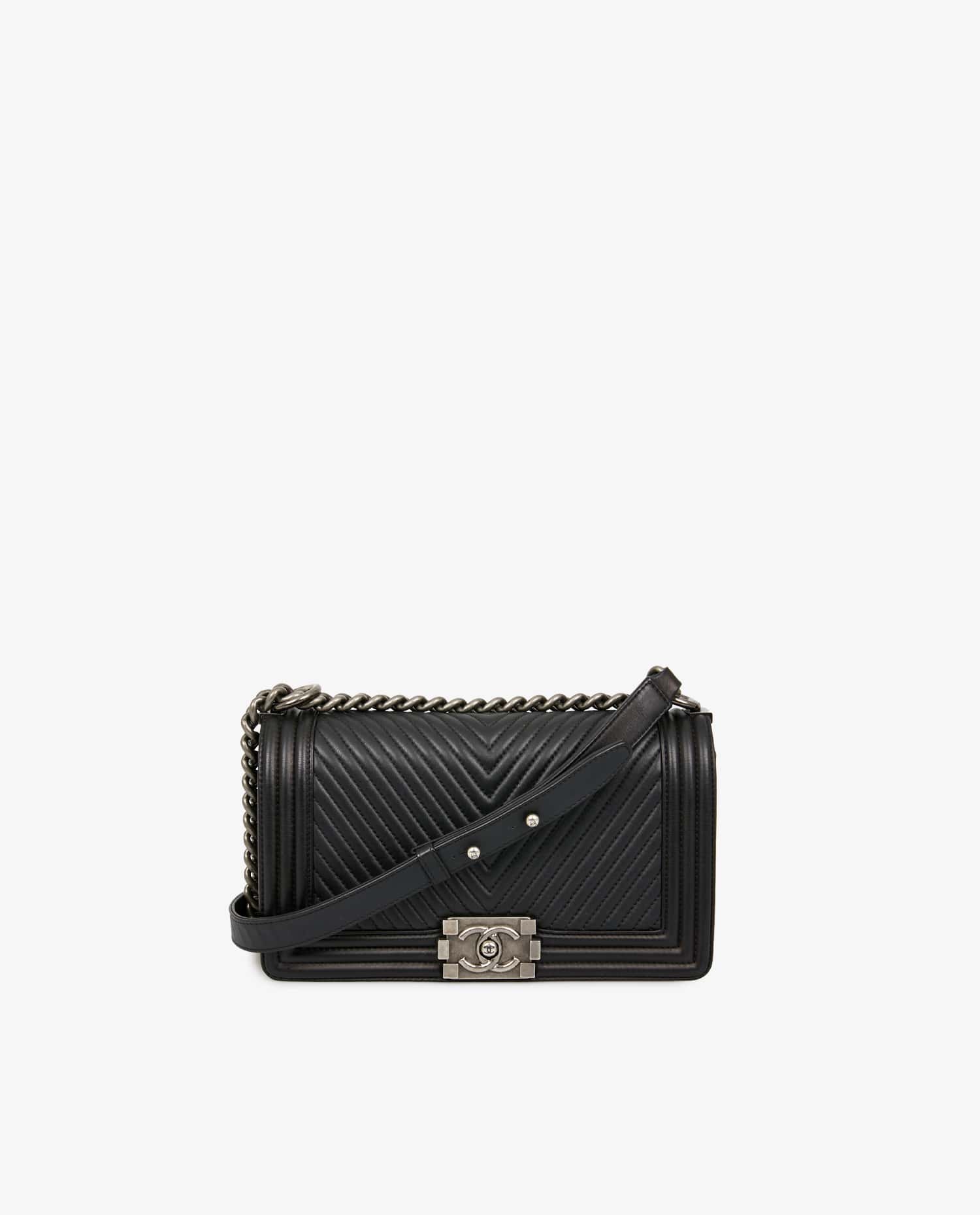 Chanel — Boy Chanel black herringbone bag