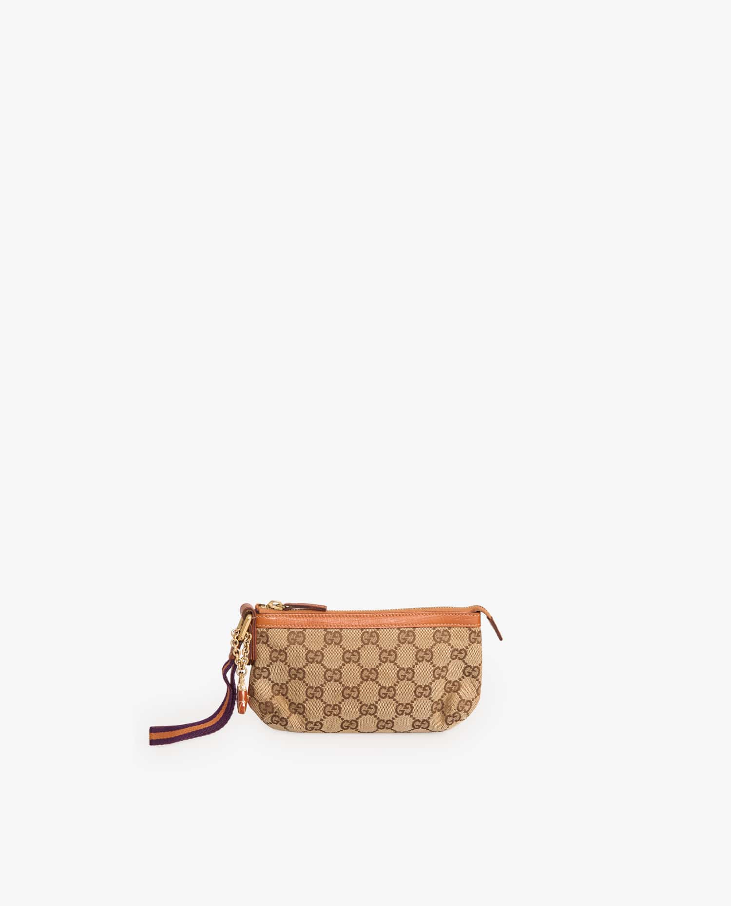 Gucci — Vintage Gucci clutch in Monogram canvas