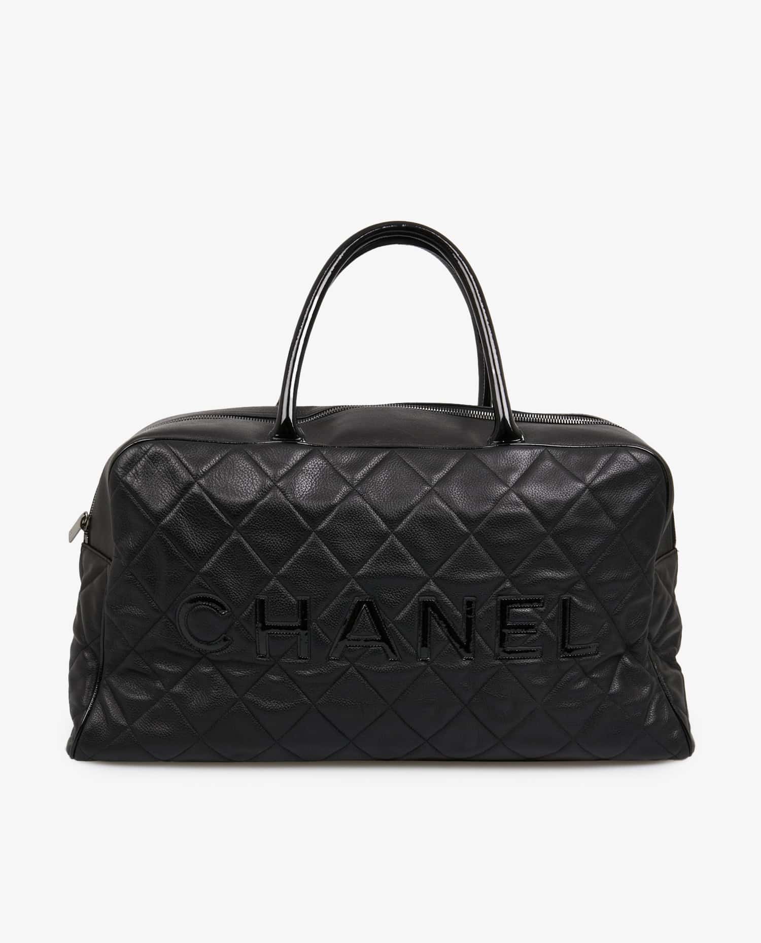 Chanel — Sac Chanel Boston cuir grainé noir