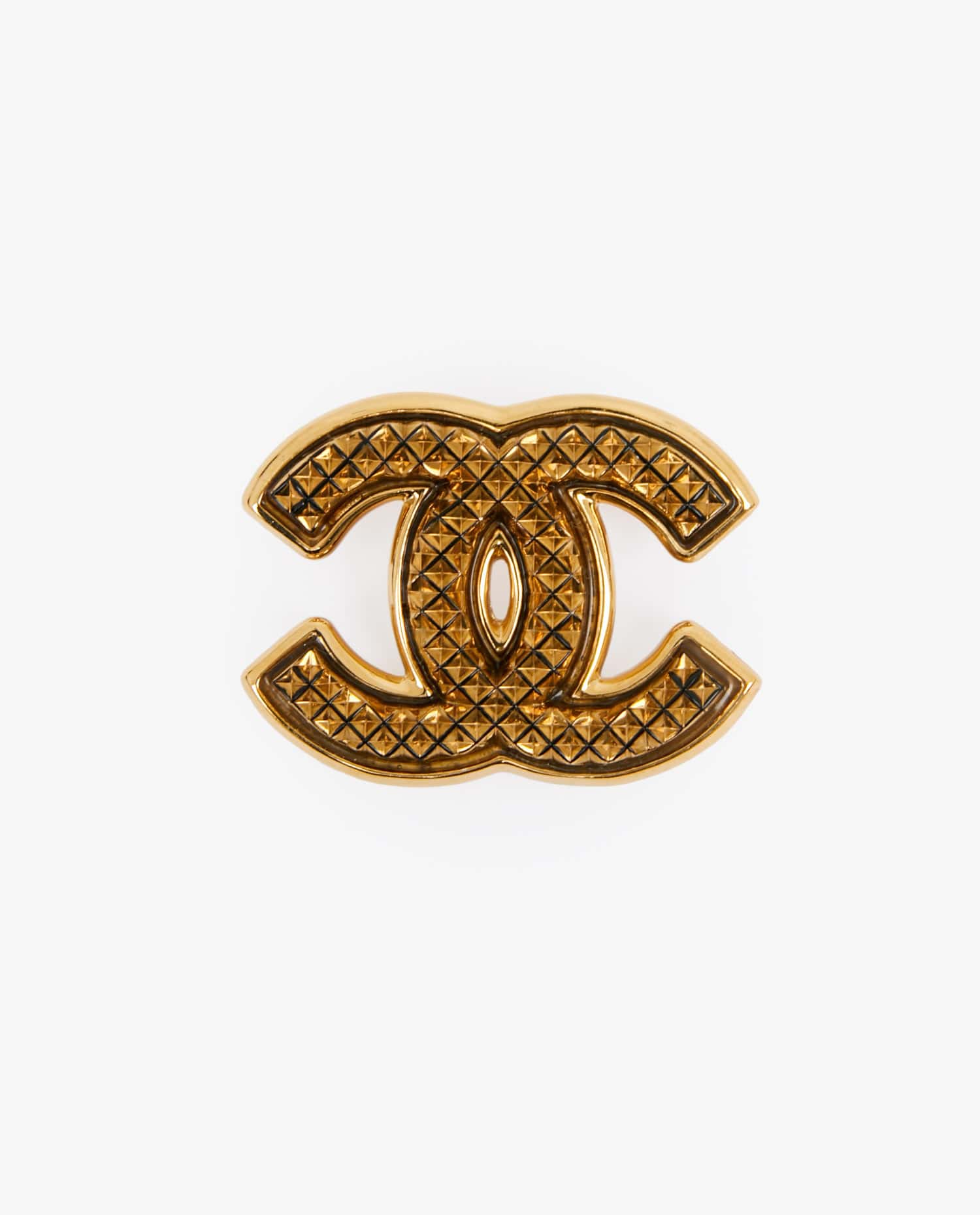 Chanel — Broche Chanel matelassée dorée